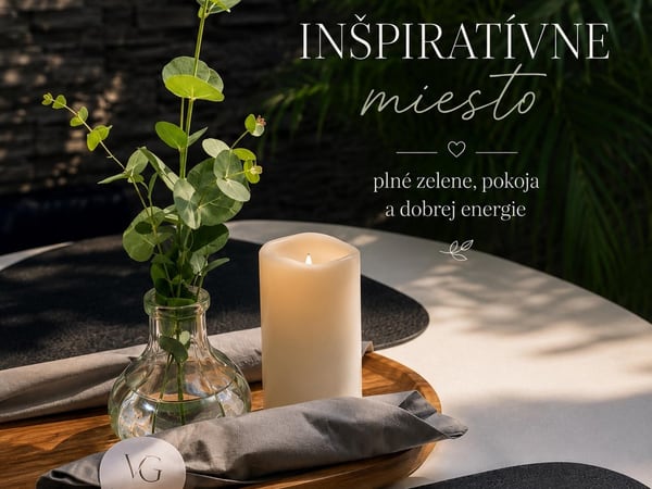 A candle and eucalyptus on a table at Vila Garufa – an inspiring place full of calm